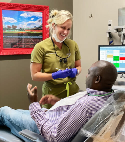 Dr Jillian Samela DDS Discussing Dentures with Patient